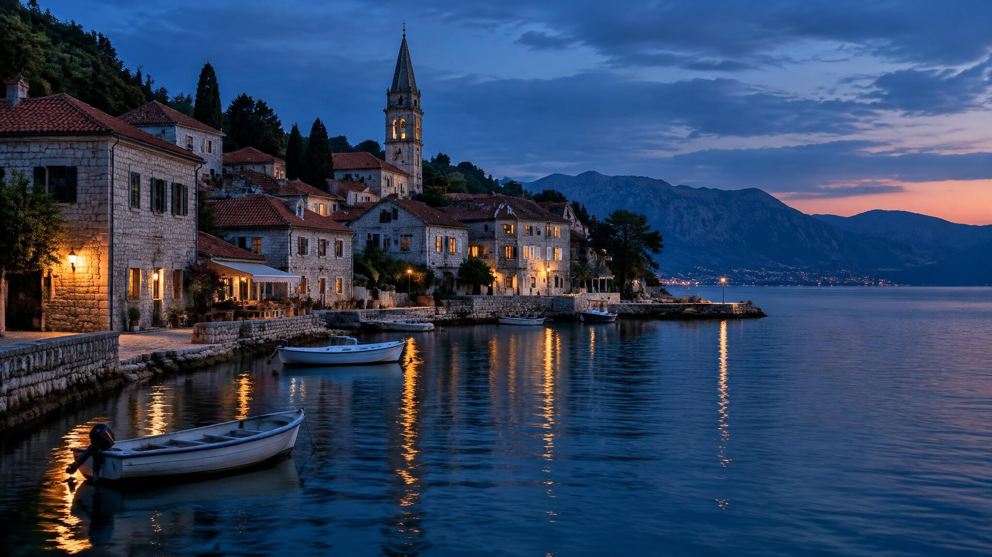 Adriatic coastal town at dusk with stone houses